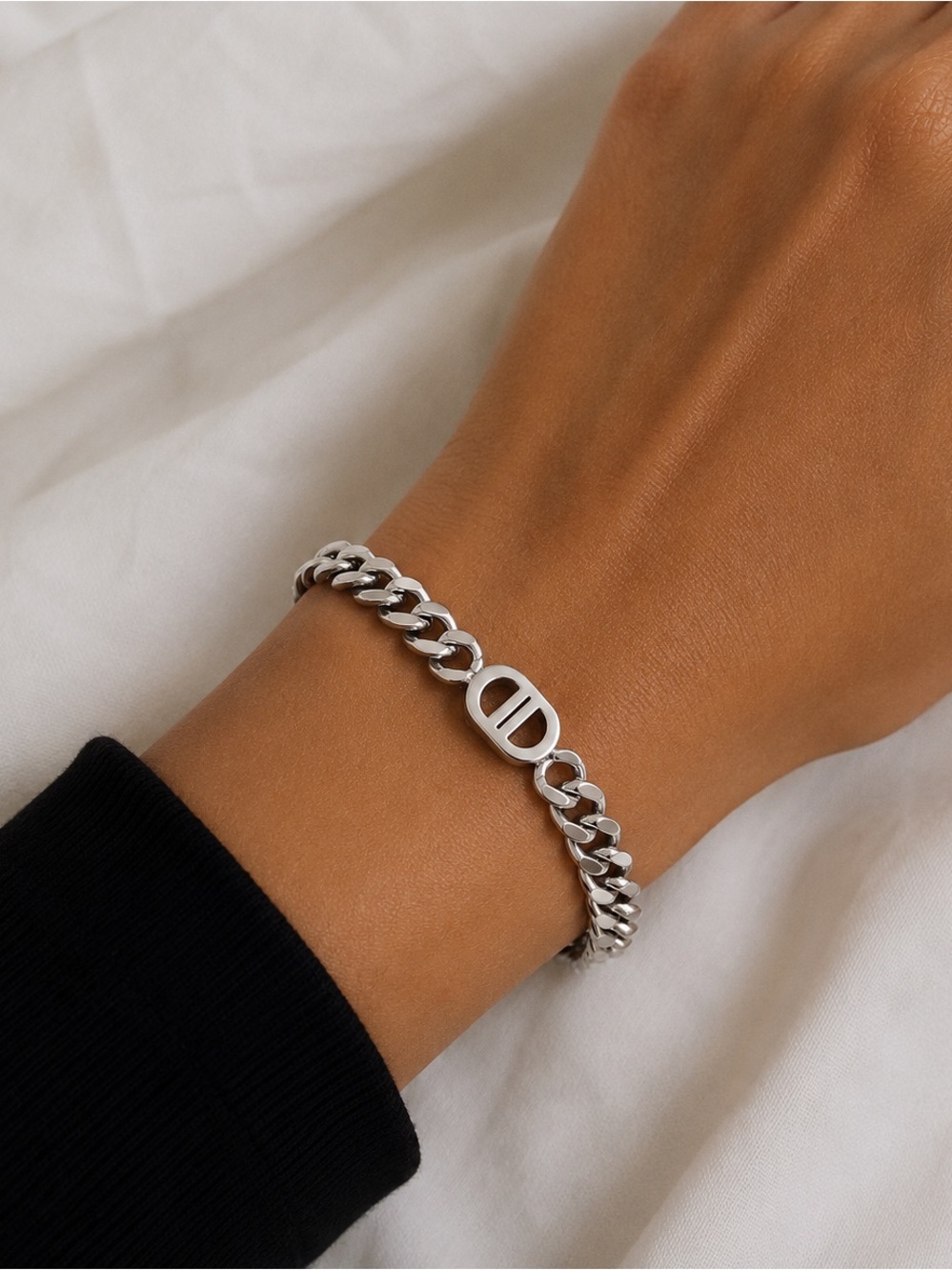 Luxury Silver Tone Chain Bracelet with Circular Logo Accent NWOT